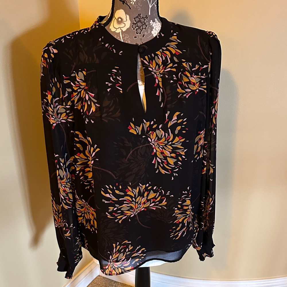 CAbi Elegant Black Blouse with Vibrant Floral Accents
